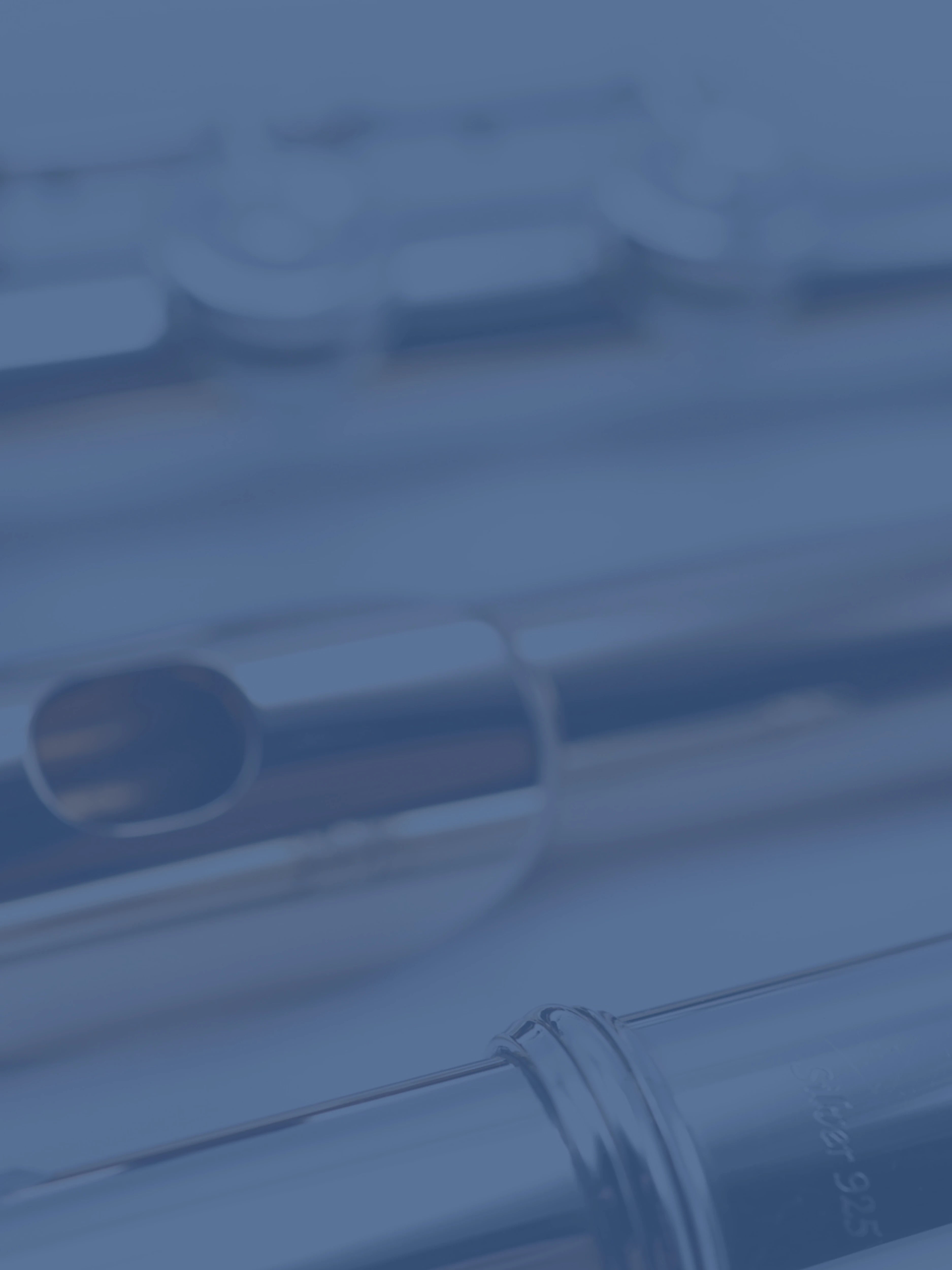 blue background with blurred image of flute