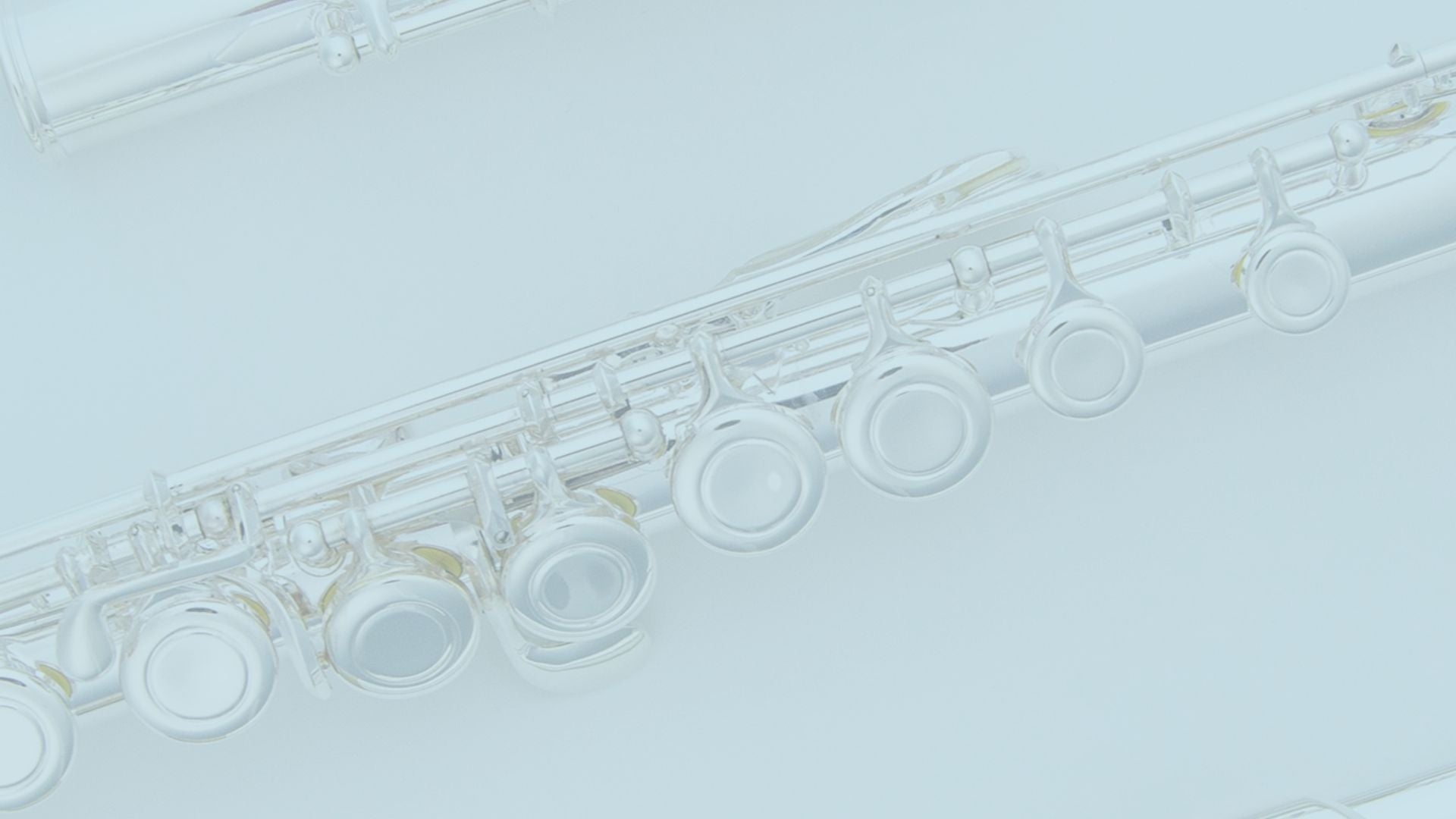 blue background with photo of gemeinhardt 2sp flute